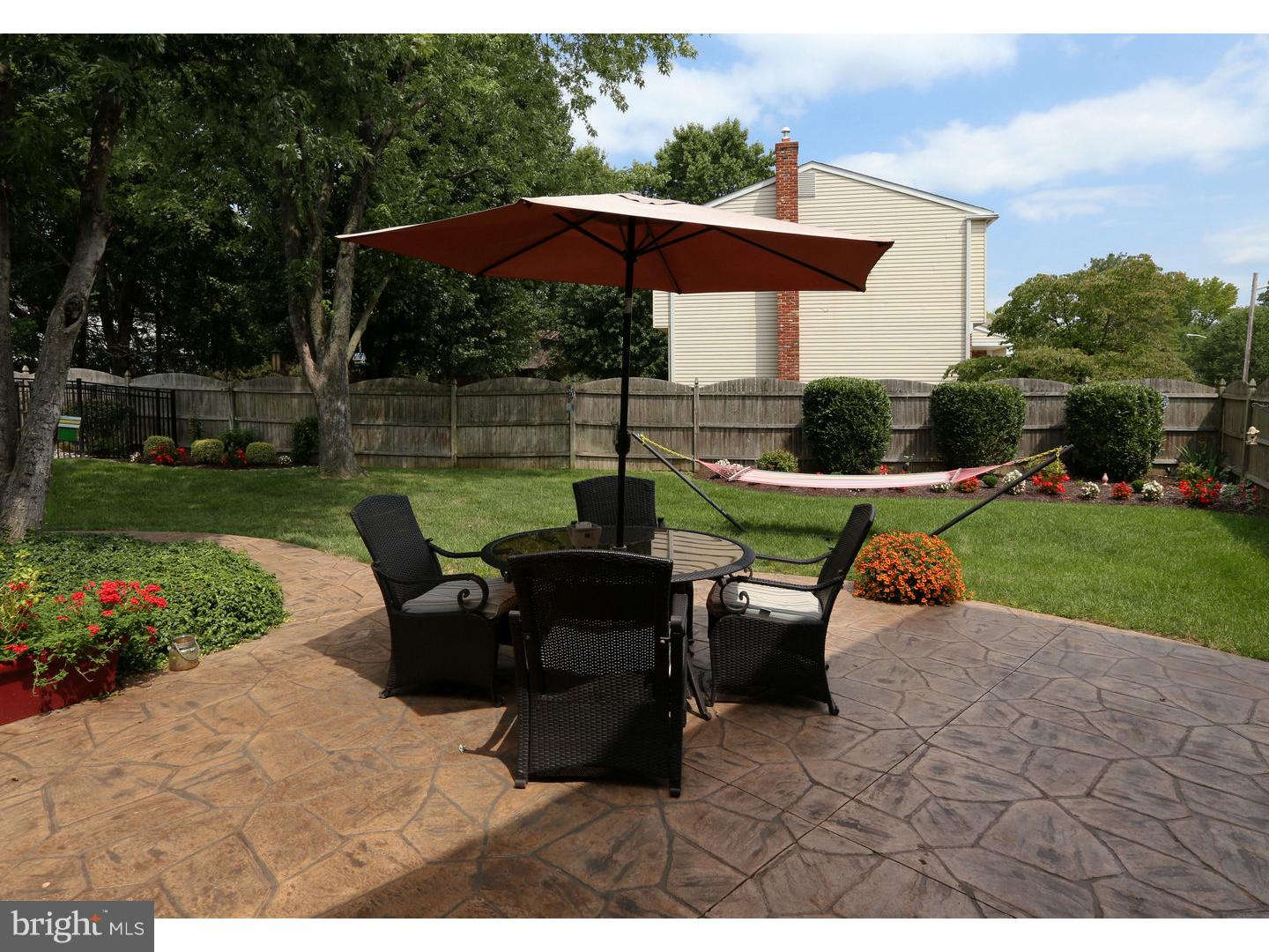 737 Grant Road Mount Laurel, NJ 08054 - Photo 22 of 25 a view of outdoor space yard deck patio and outdoor kitchen