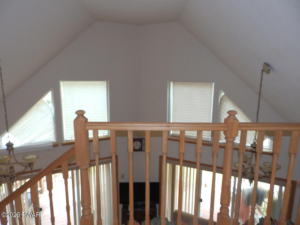 186 Skyview Road Dingmans Ferry, PA 18328 - Photo 20 of 33 a view of staircase with lots of windows