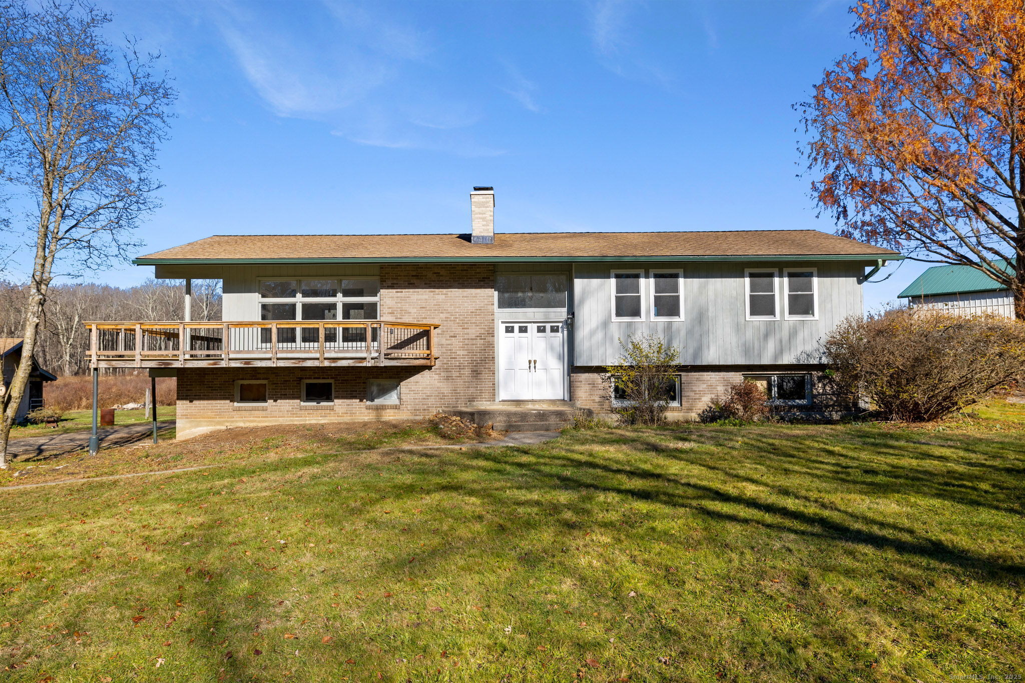 a front view of a house with swimming pool
