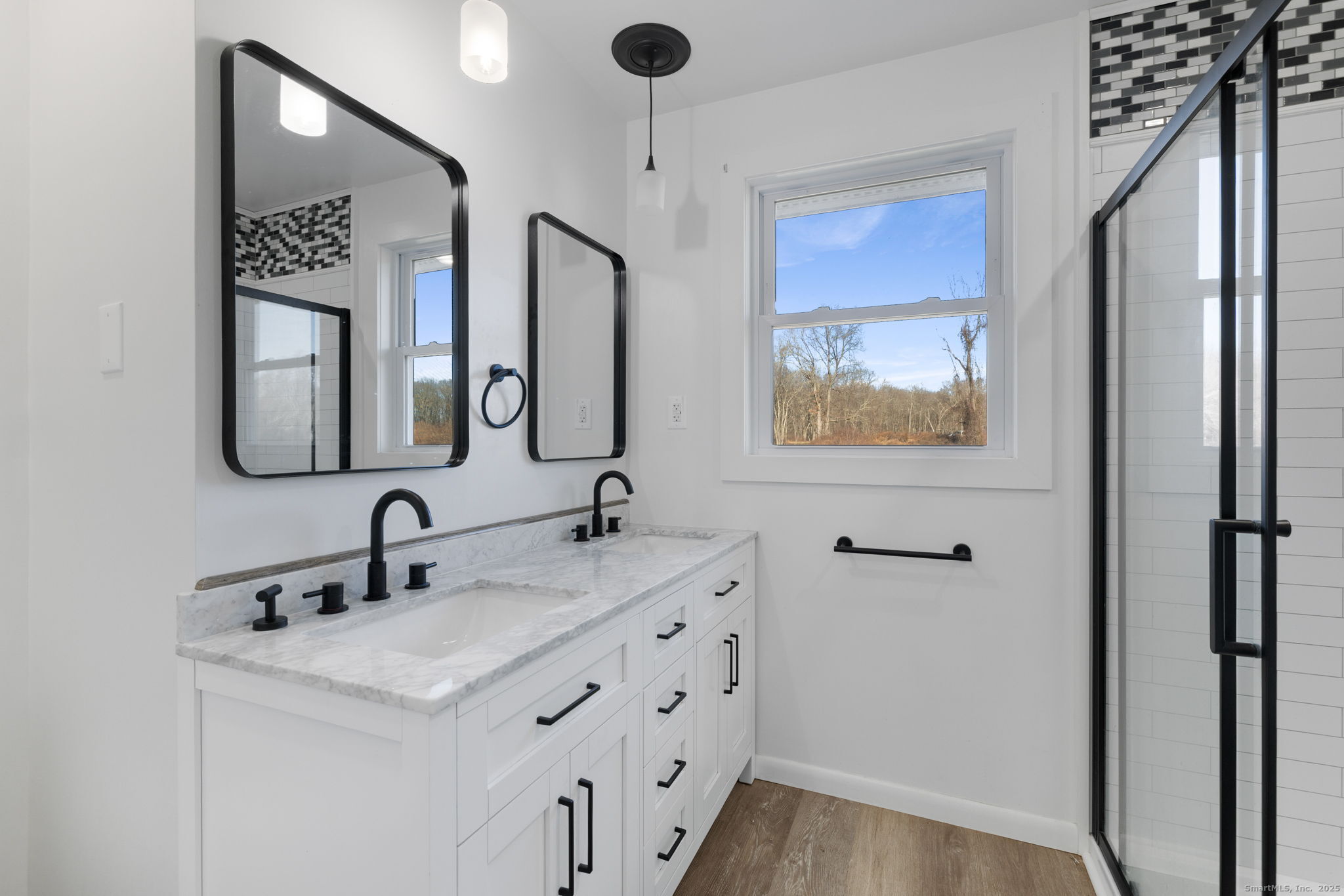 475 Parum Road Colchester, CT 06415 - Photo 14 of 28 a bathroom with 2 sink and a mirror