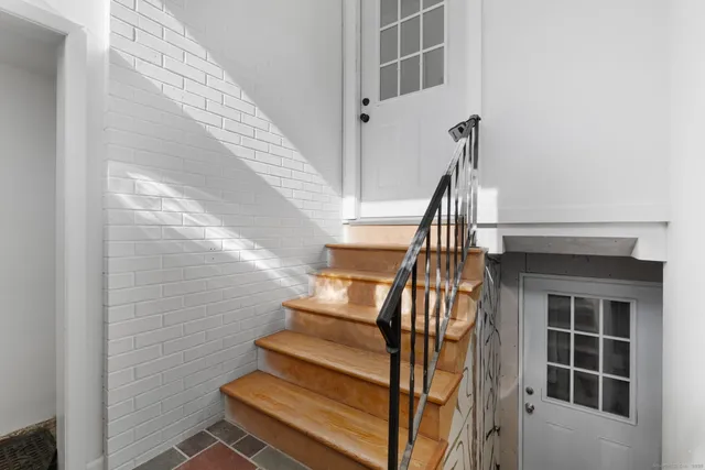 a view of entryway with a front door