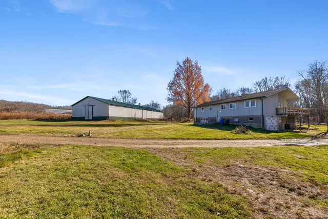 a swimming pool with wooden fence