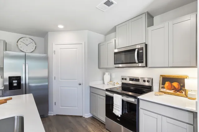 a room with sink and mirror