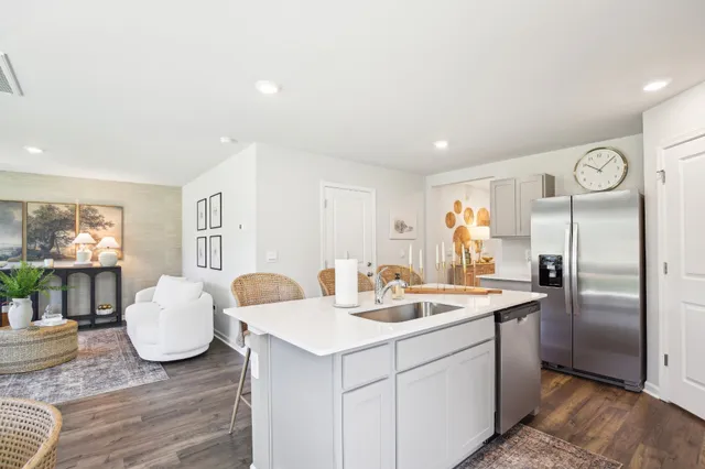 an entryway with wooden floor