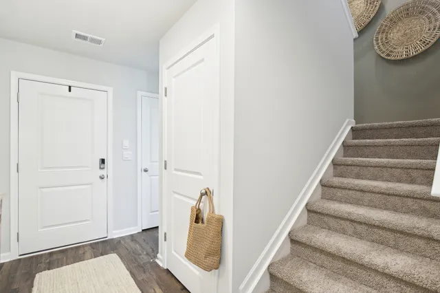 a bedroom with a bed with outer view and window