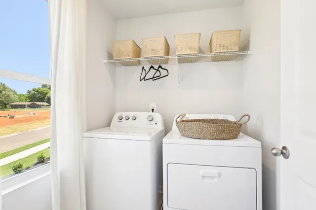 a bedroom with a bed and a table