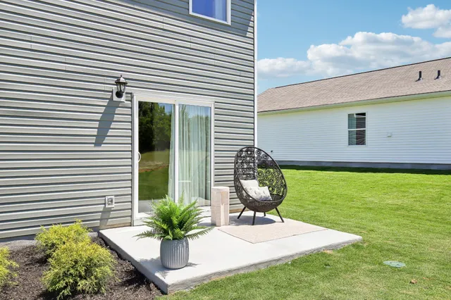 a front view of house with yard