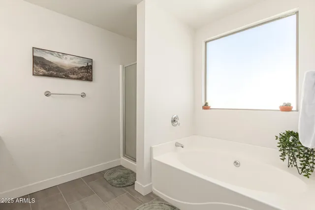 a view of storage and utility room with racks on the wall