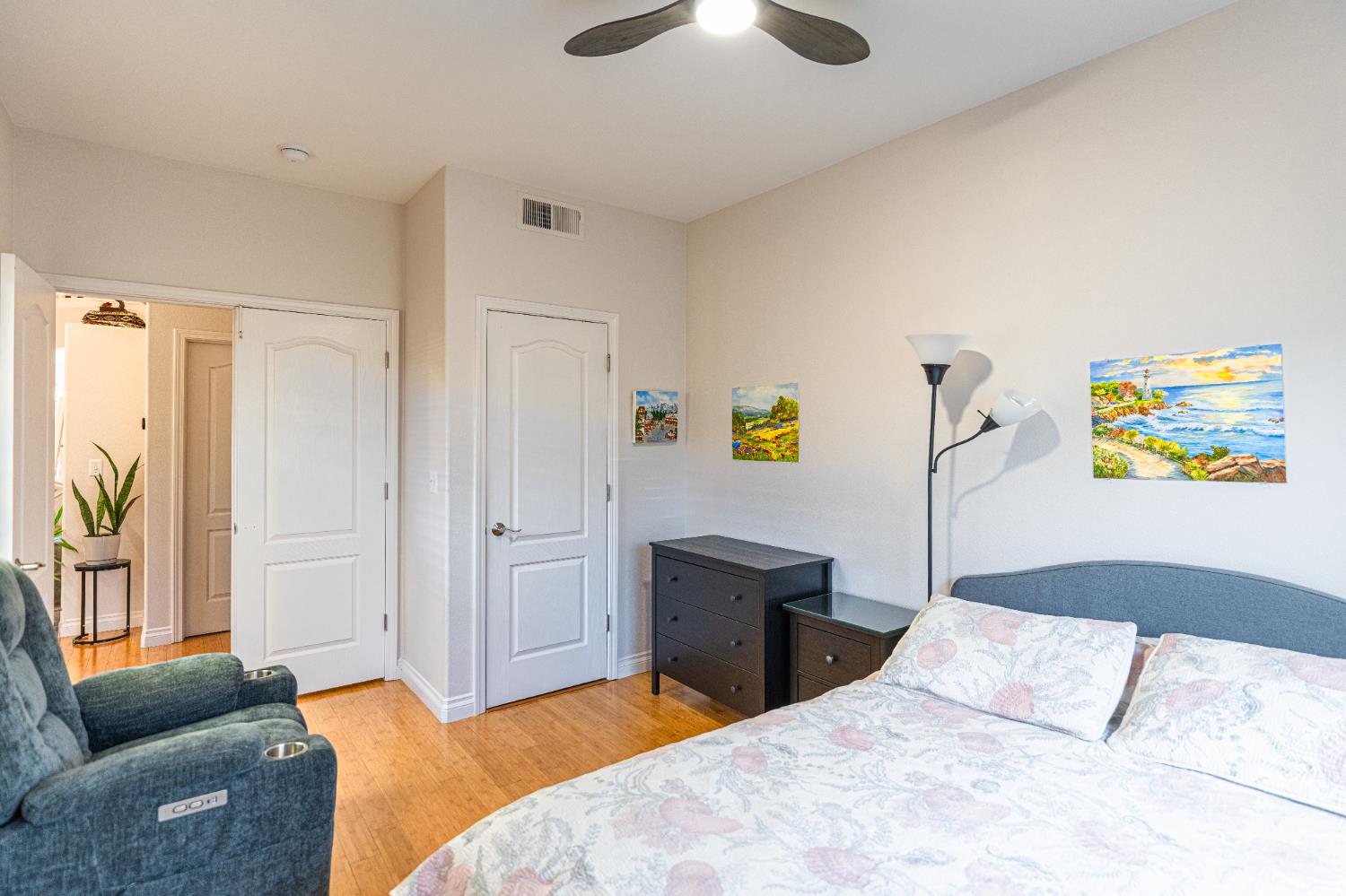 2322 East Revere Road Fresno, CA 93720 - Photo 10 of 33 a bedroom with a bed and a couch