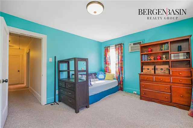 a bedroom with furniture and closet