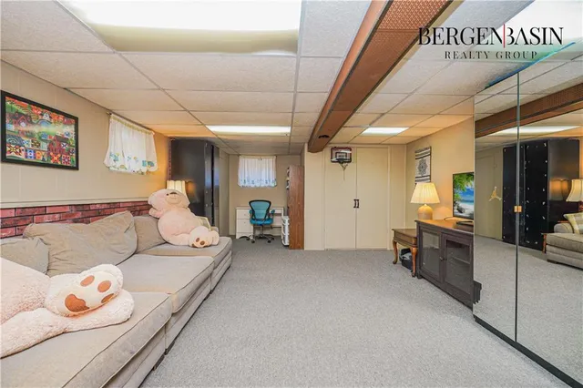 a living room with furniture and a table