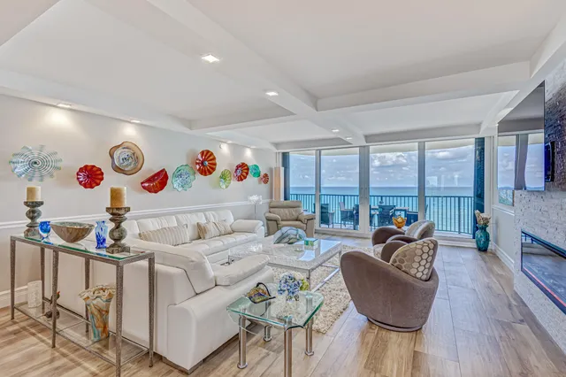 a spacious bedroom with a large bed and a couch