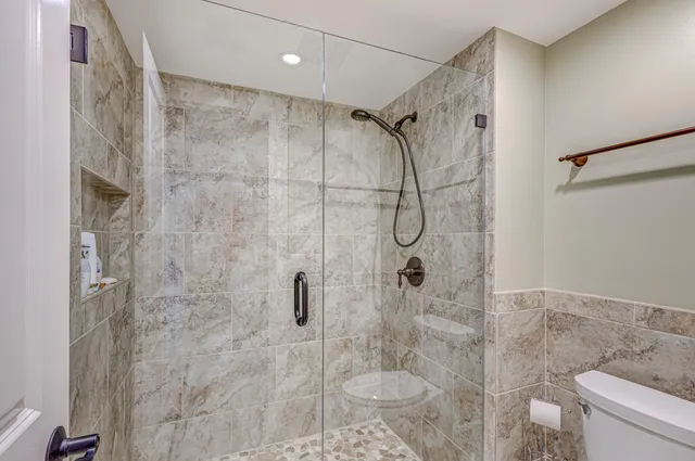 a view of a balcony with furniture and a balcony