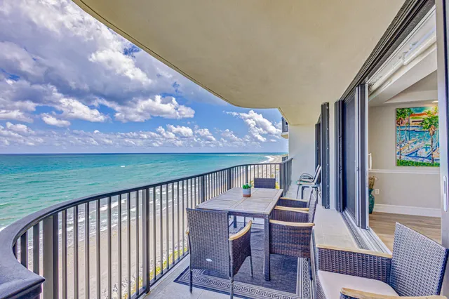 a view of a balcony with an outdoor space