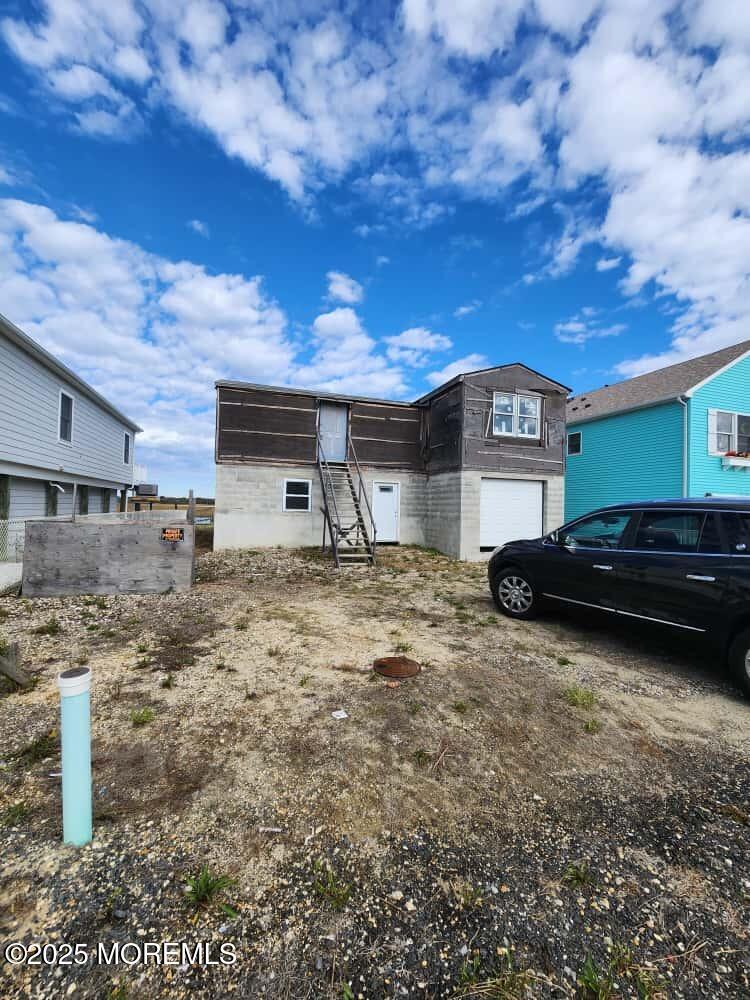 389 Kingfisher Road Tuckerton, NJ 08087 - Photo 6 of 13 a front view of a house with a garden