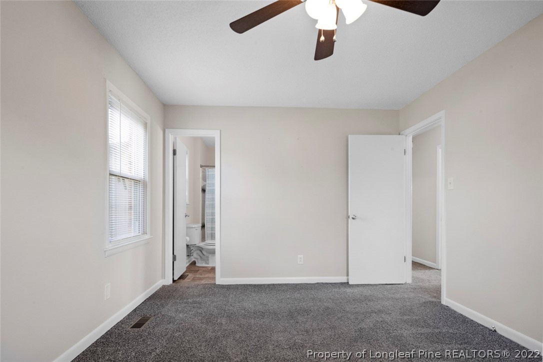 6614 Wake Forest Road Fayetteville, NC 28311 - Photo 40 of 48 an empty room with fan