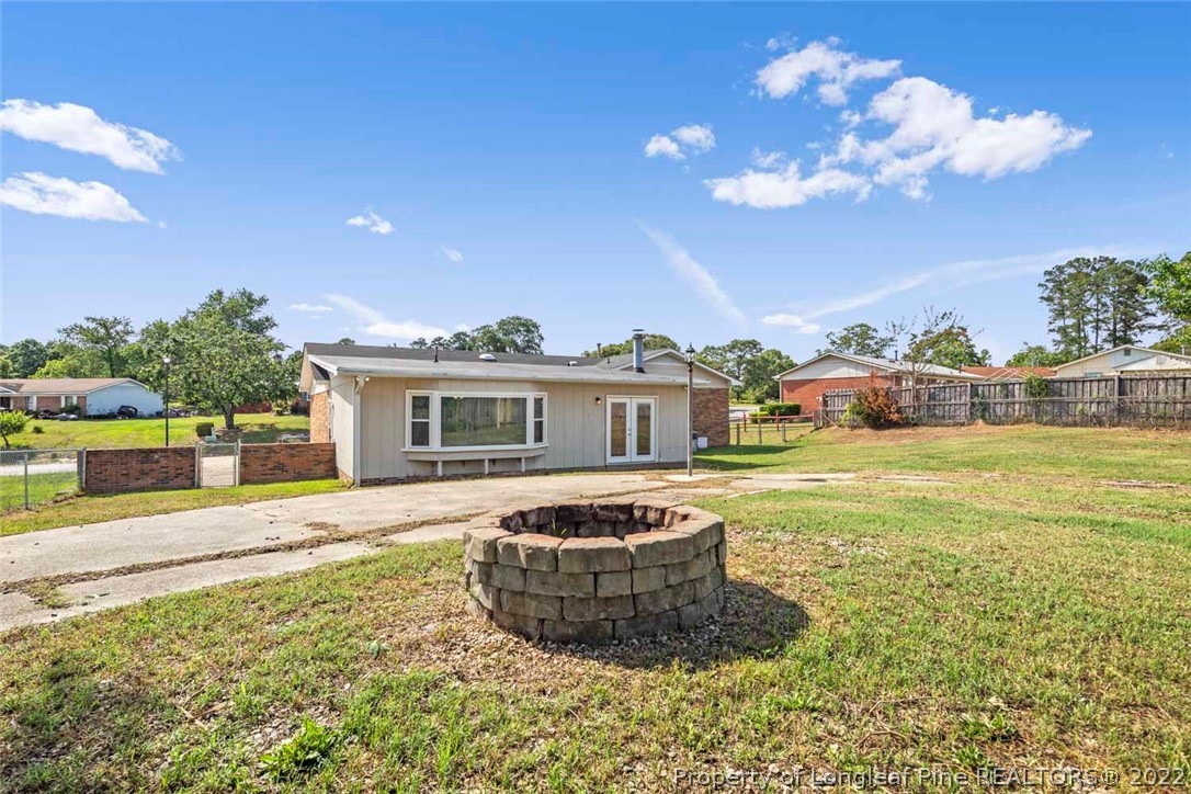 6614 Wake Forest Road Fayetteville, NC 28311 - Photo 45 of 48 a front view of house with yard and entertaining space