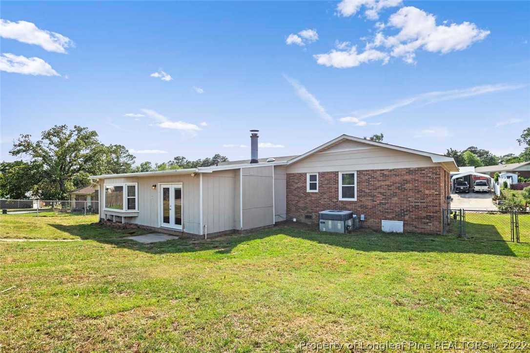 6614 Wake Forest Road Fayetteville, NC 28311 - Photo 47 of 48 a front view of a house with a yard