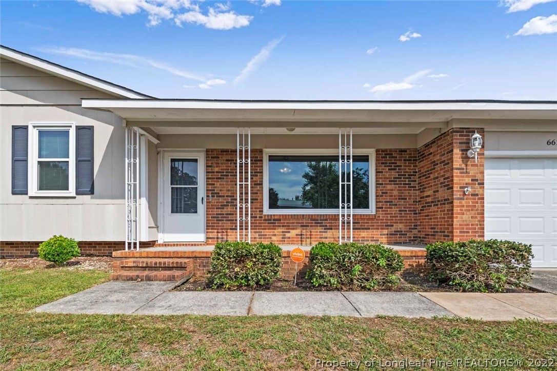 6614 Wake Forest Road Fayetteville, NC 28311 - Photo 8 of 48 front view of a house