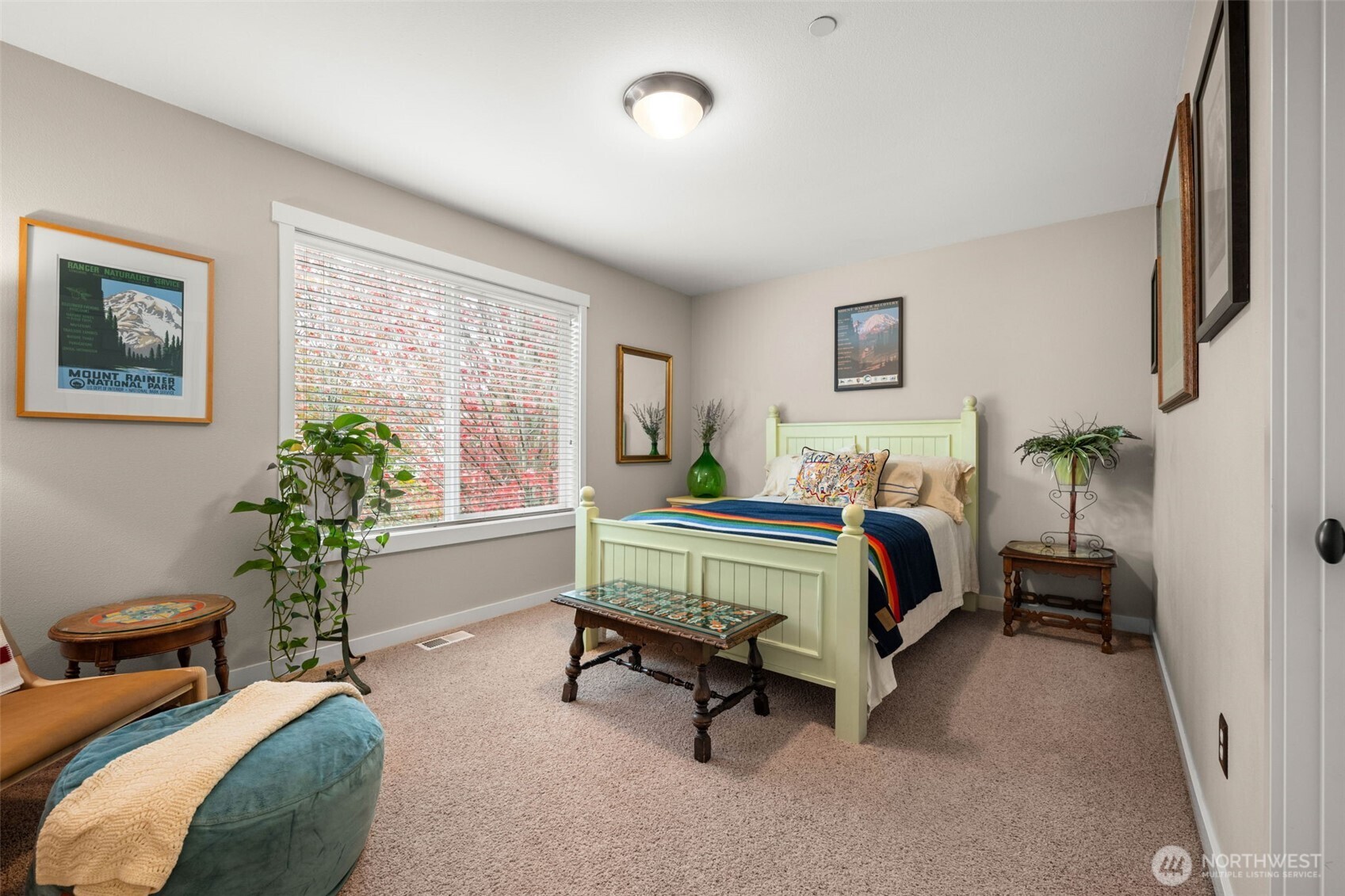 3114 Walker Road DuPont, WA 98327 - Photo 26 of 38 a bedroom with a bed and a potted plant