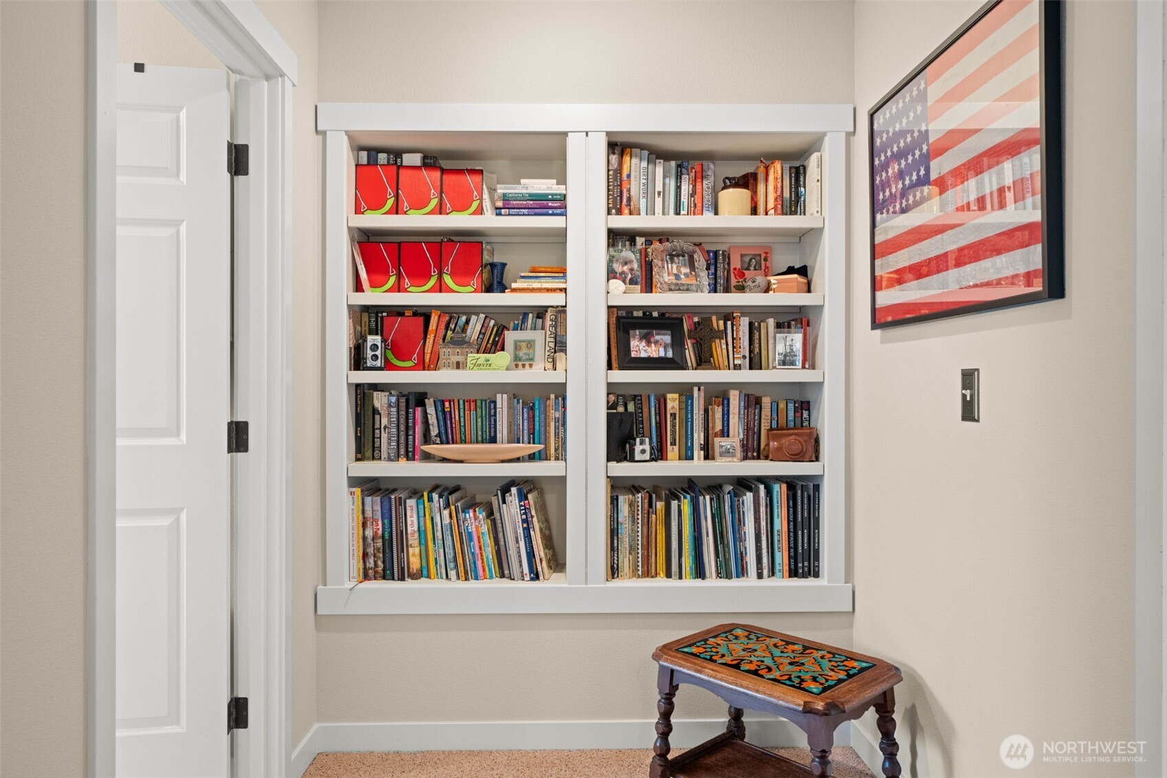 3114 Walker Road DuPont, WA 98327 - Photo 32 of 38 a room with bookshelf lots of books and table