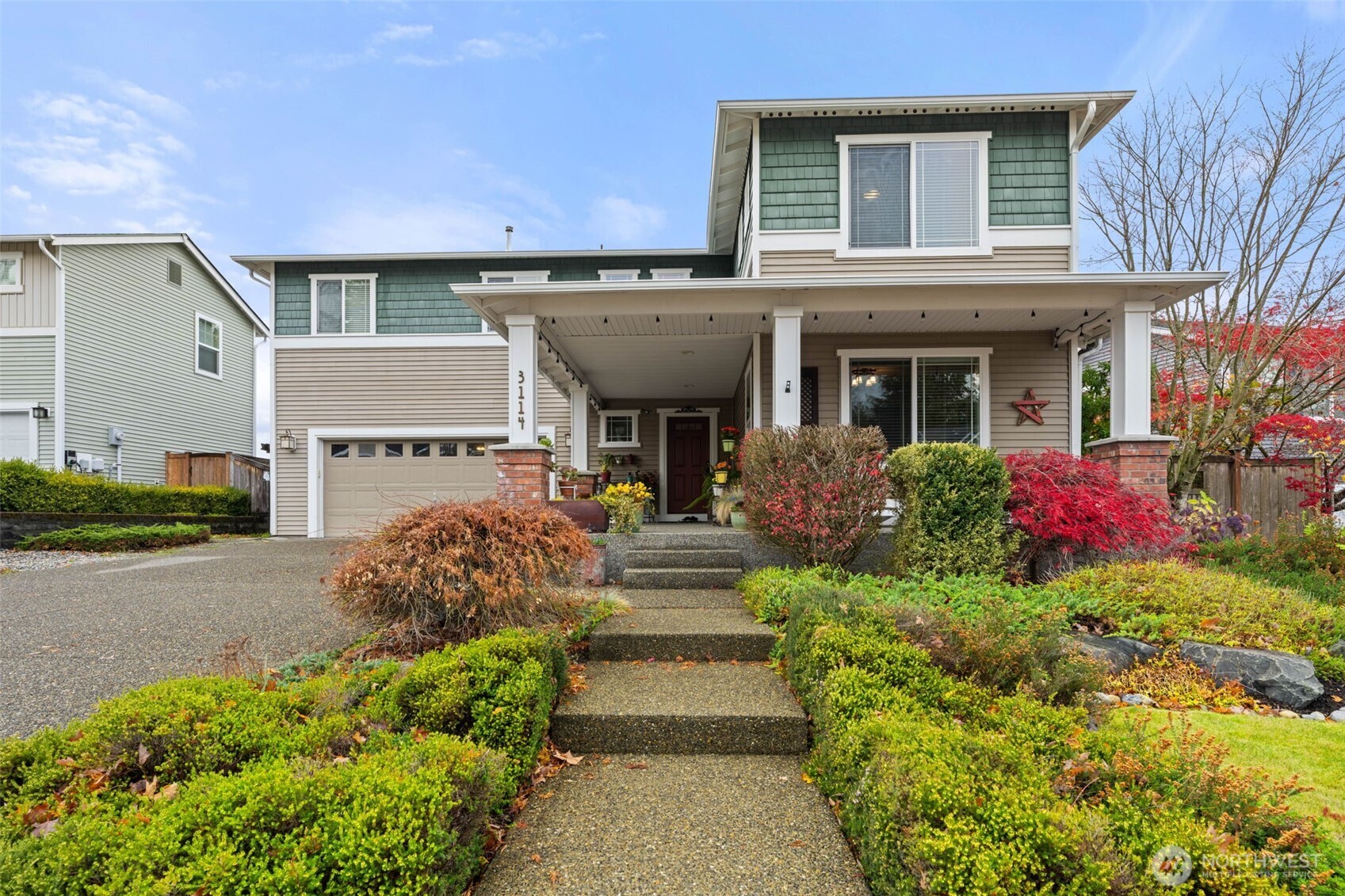 3114 Walker Road DuPont, WA 98327 - Photo 38 of 38 a front view of a house with plants and entryway