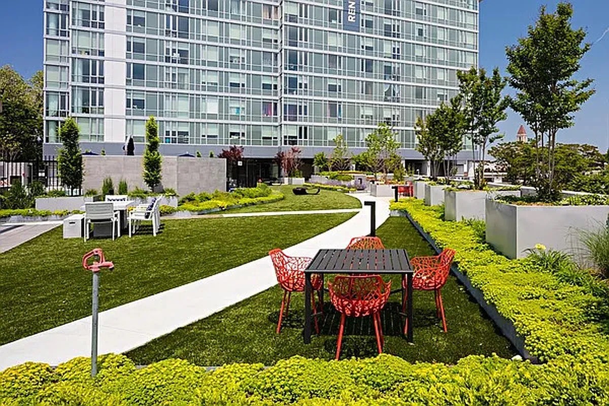 1524 Sheepshead Bay Road, Unit 3C Brooklyn, NY 11235 - Photo 17 of 25 a swimming pool with outdoor seating and yard