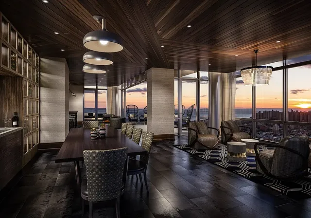 a view of a kitchen with wooden floor