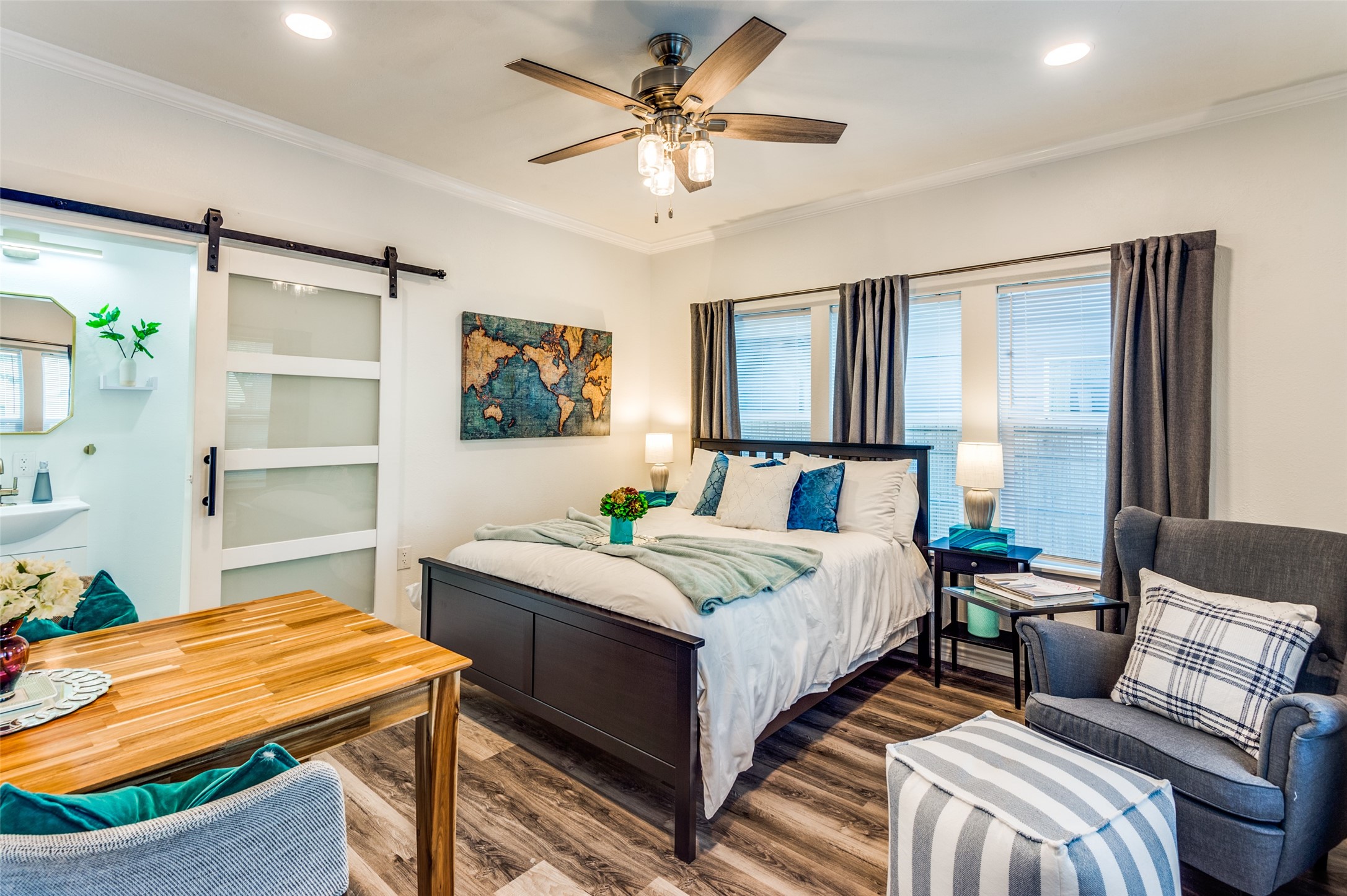 2410 Truxillo Street Houston, TX 77004 - Photo 30 of 41 Unit C (Studio): Open-concept studio space combines living, sleeping, and dining areas seamlessly with luxury vinyl flooring, neutral tones, and abundant natural light.
