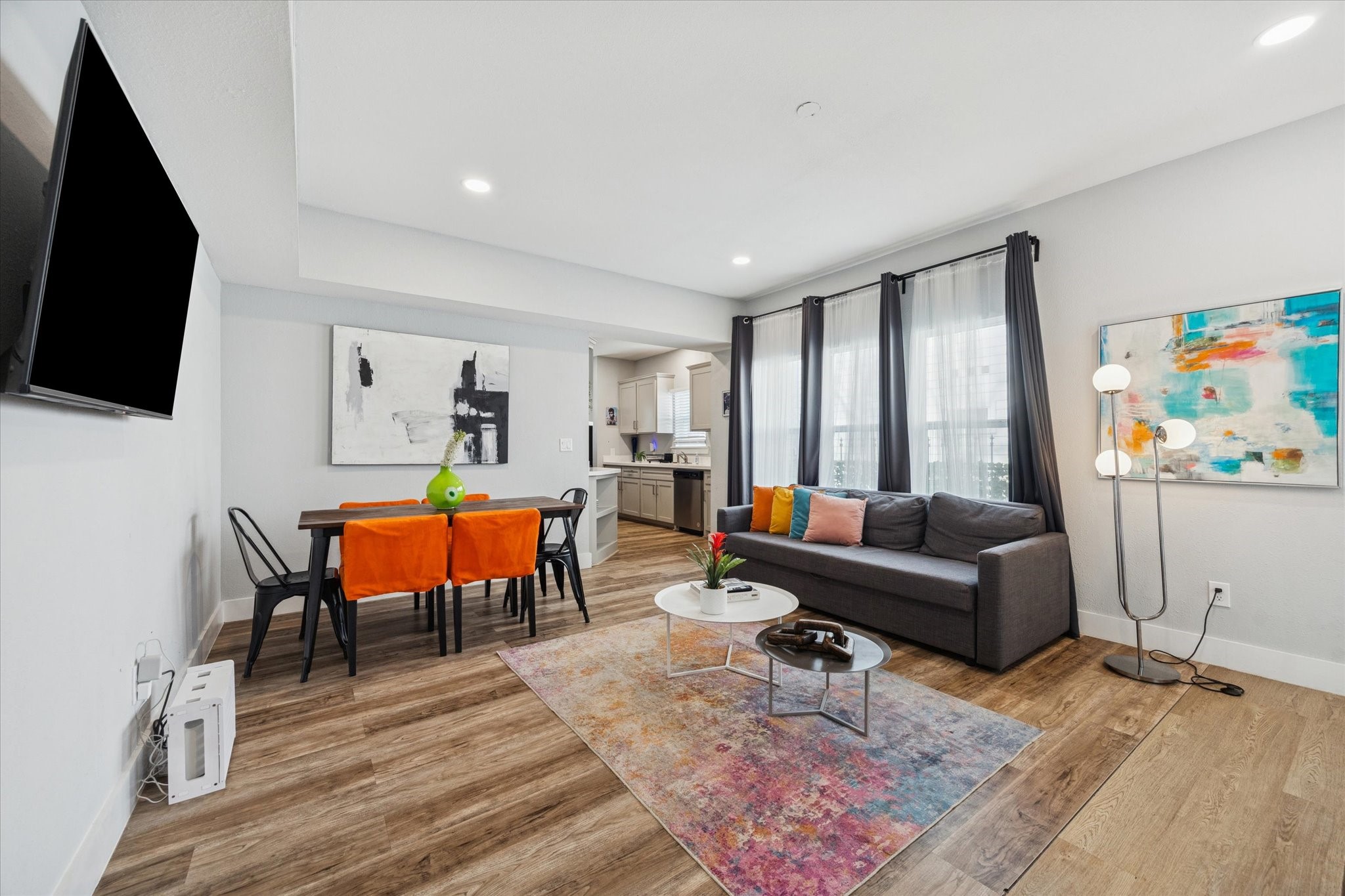 2410 Truxillo Street Houston, TX 77004 - Photo 6 of 41 Unit A (2-Bedroom): Generous living room highlighted by large windows, natural light, and modern finishes that enhance the unit’s airy feel.