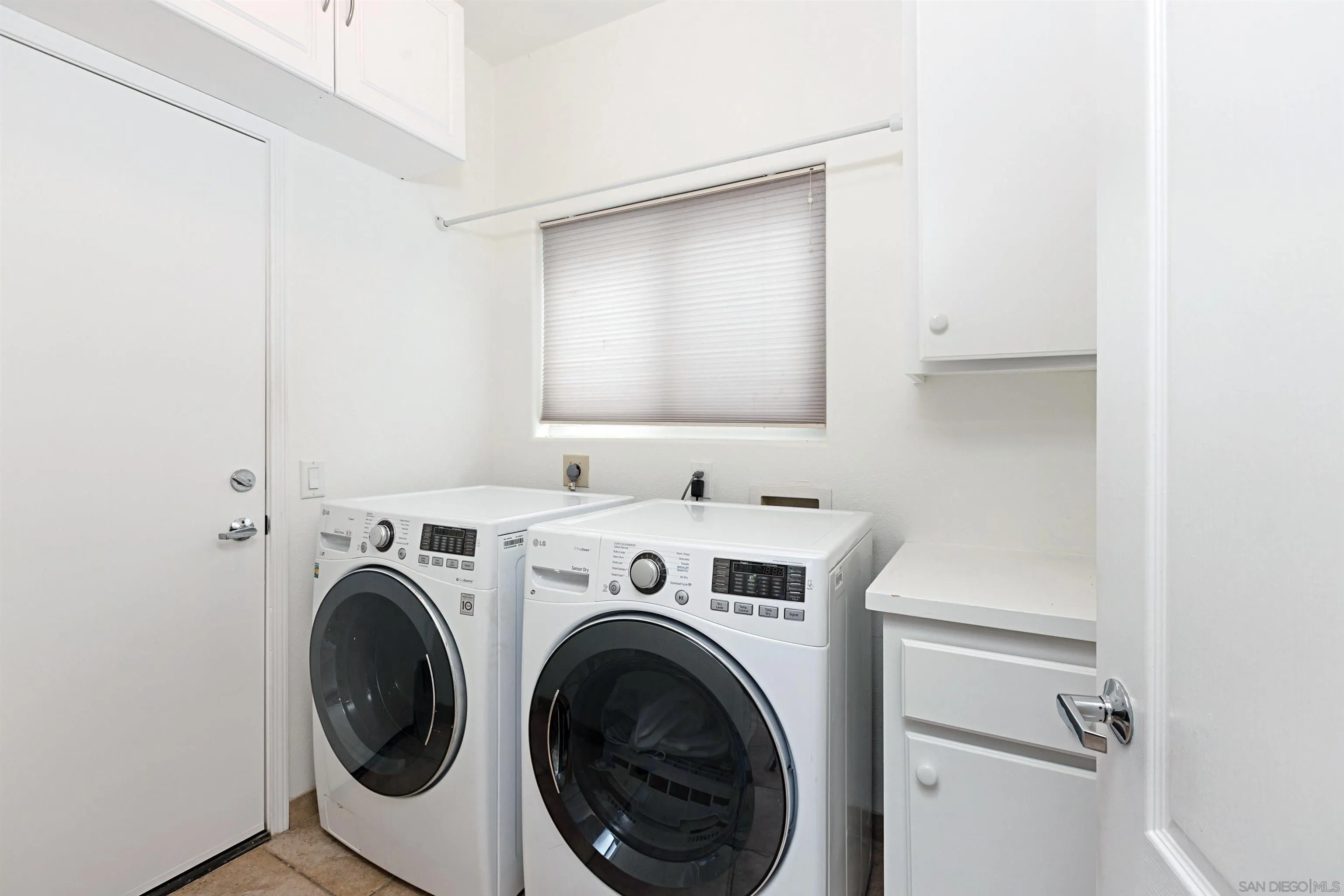 4158 Pindar Way Oceanside, CA 92056 - Photo 16 of 35 a utility room with dryer and washer