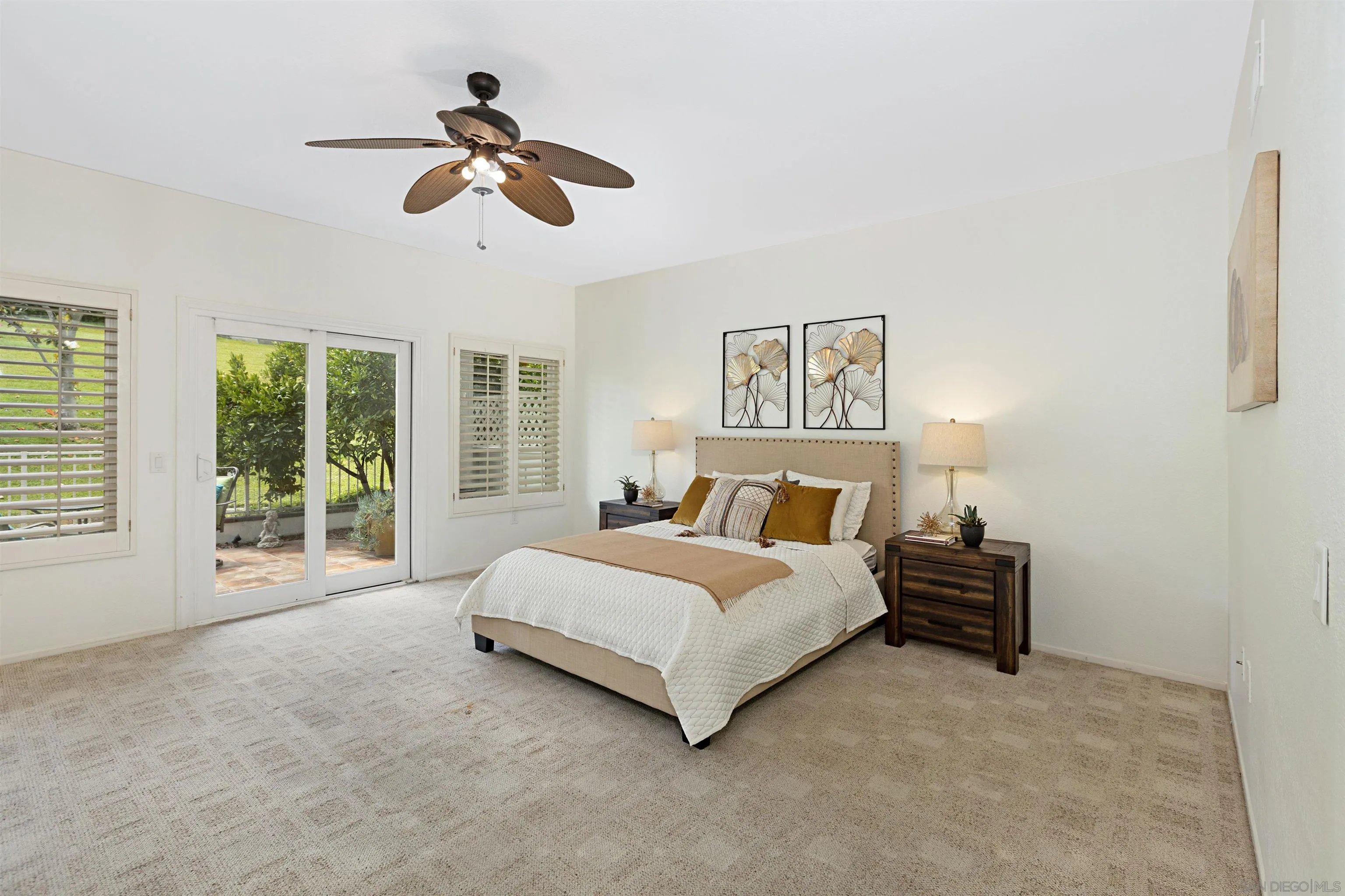 4158 Pindar Way Oceanside, CA 92056 - Photo 19 of 35 a bed room with a bed and a chandelier