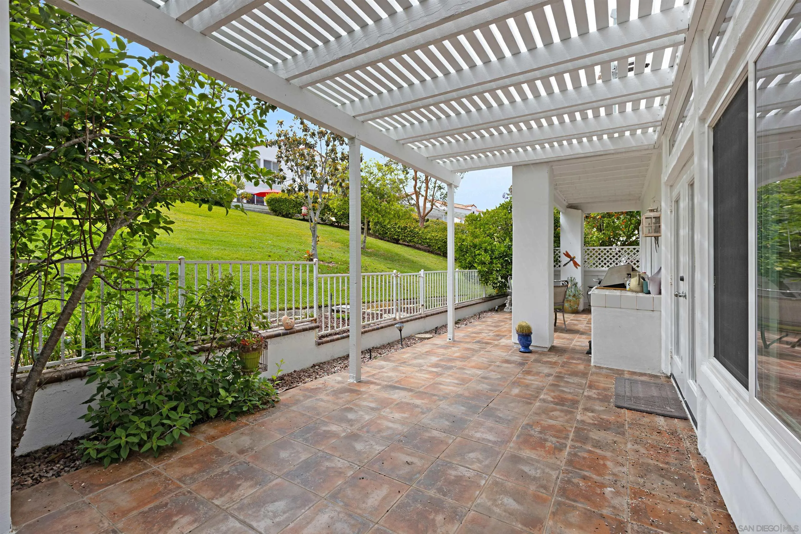 4158 Pindar Way Oceanside, CA 92056 - Photo 28 of 35 a view of a house with a porch and a patio