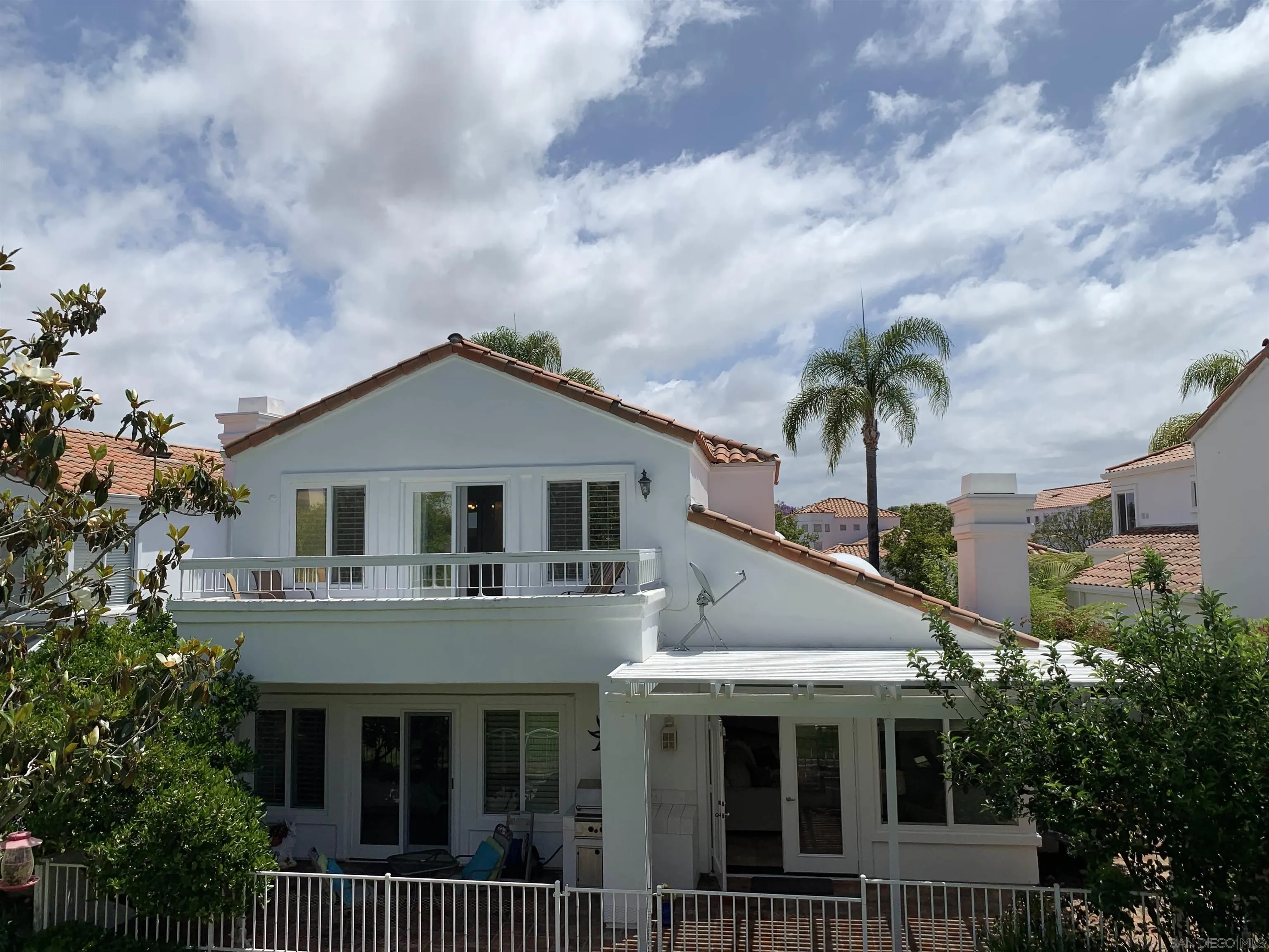 4158 Pindar Way Oceanside, CA 92056 - Photo 31 of 35 a front view of a house with a garden