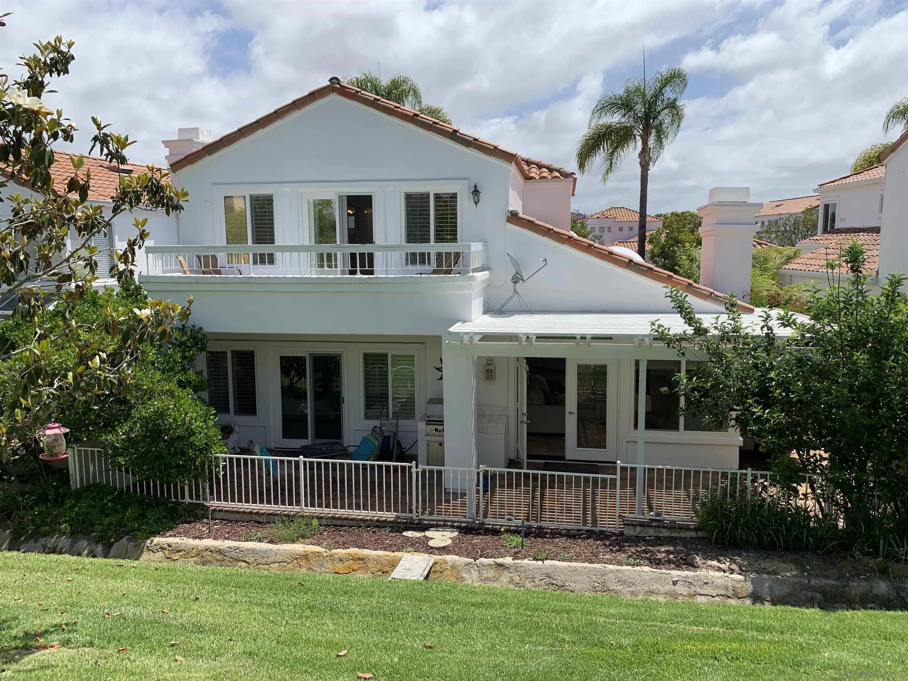 4158 Pindar Way Oceanside, CA 92056 - Photo 32 of 35 a front view of a house with a yard