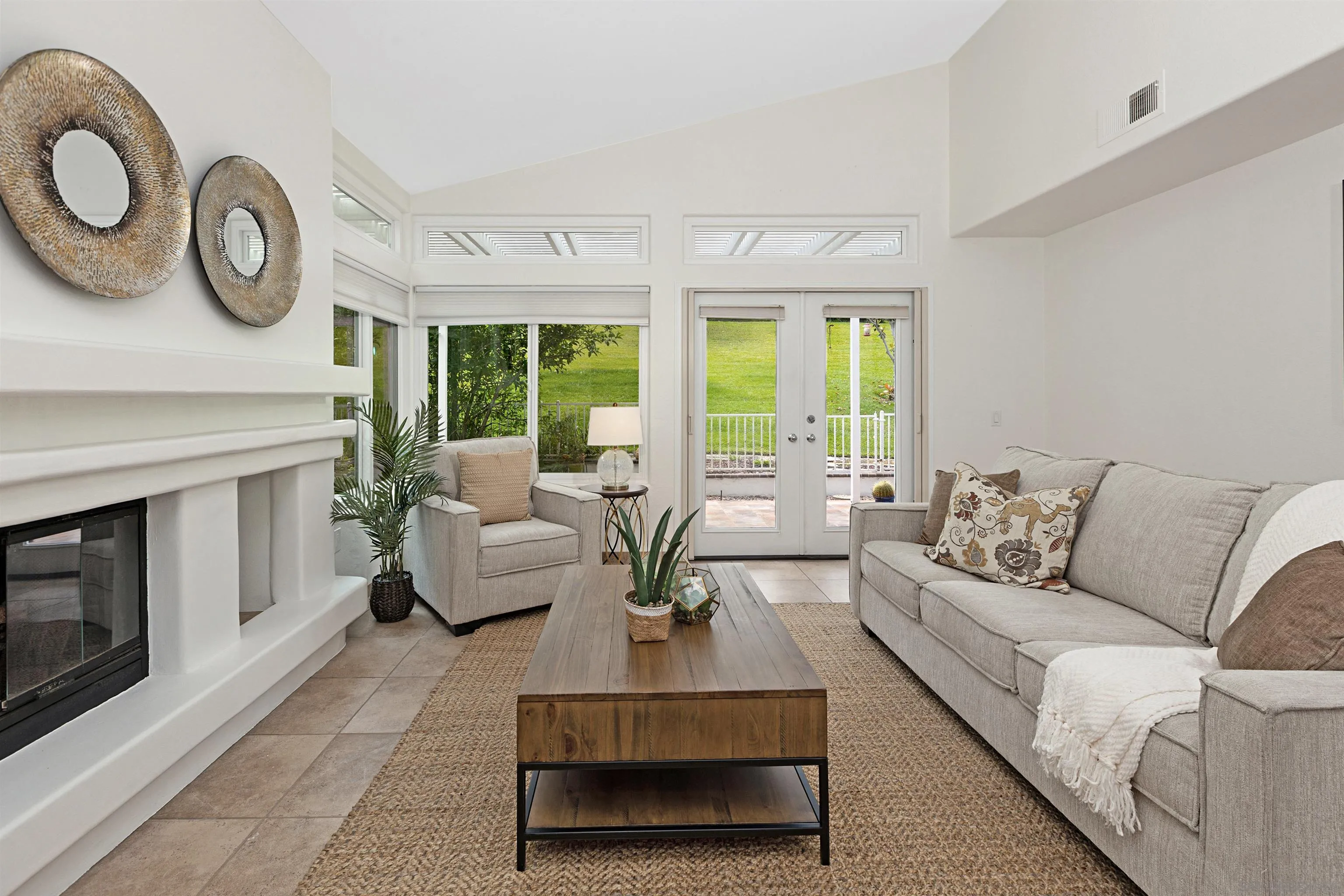 4158 Pindar Way Oceanside, CA 92056 - Photo 9 of 35 a living room with furniture a fireplace and a large window