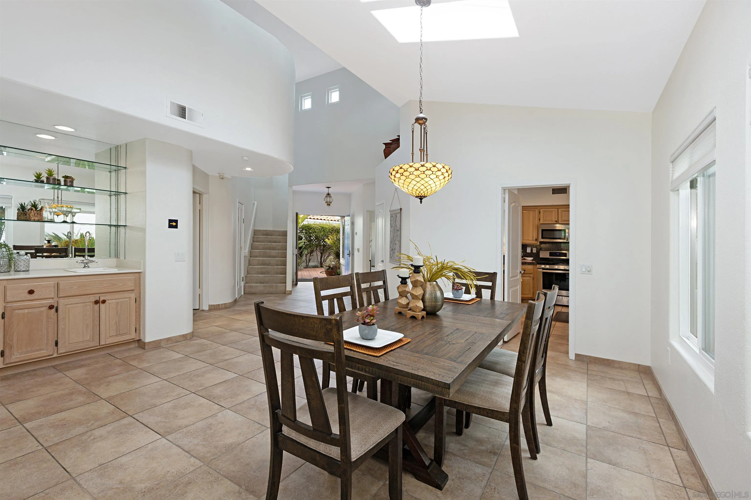 4158 Pindar Way Oceanside, CA 92056 - Photo 10 of 35 a view of a dining room and chandelier