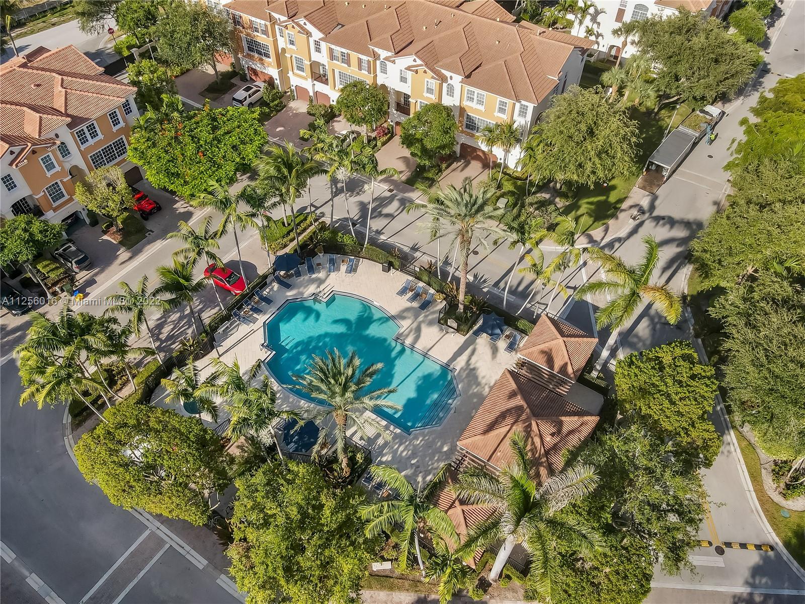 5560 Northeast Trieste Way Boca Raton, FL 33487 - Photo 7 of 28 a view of a flower