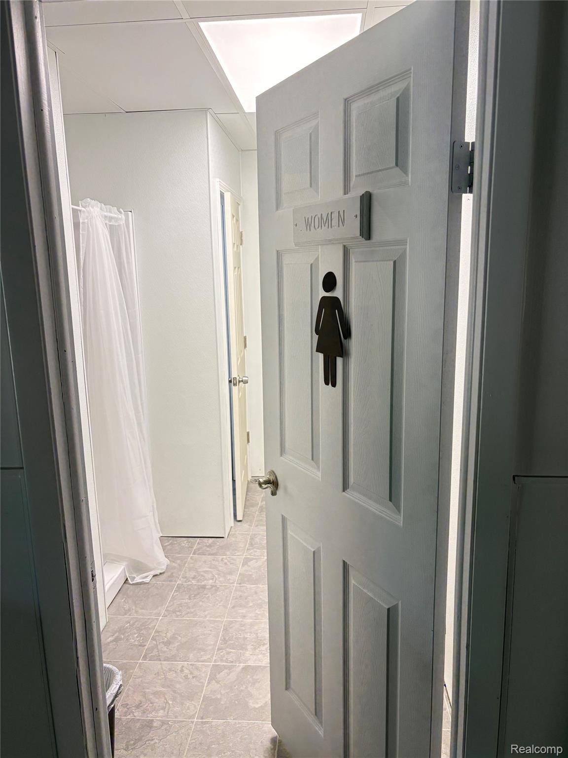 3041 Reeder Road Clarkston, MI 48346 - Photo 11 of 22 Full bathroom featuring a stall shower