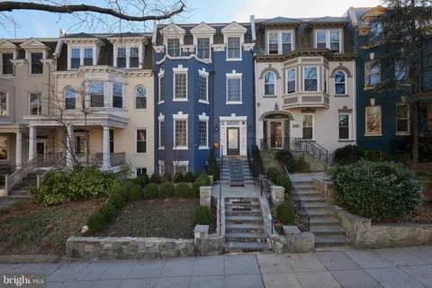 a front view of a multi story residential apartment building