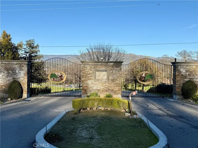 a view of a chairs and table in patio
