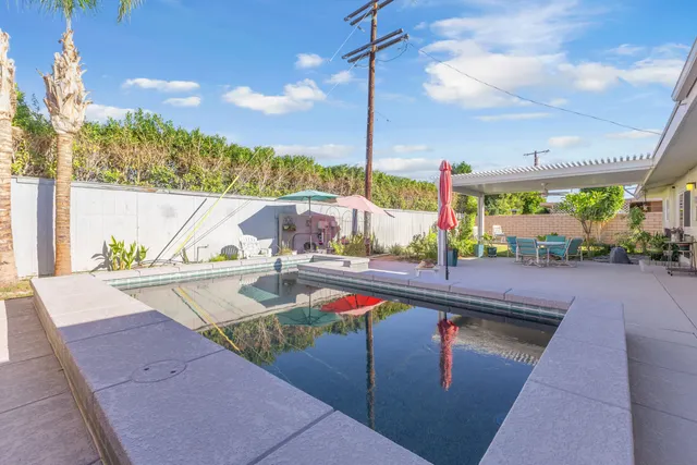 a outdoor dining space with furniture