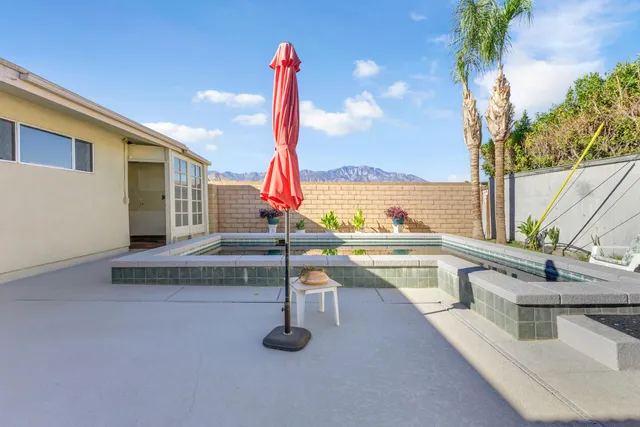 a view of a terrace with outdoor seating