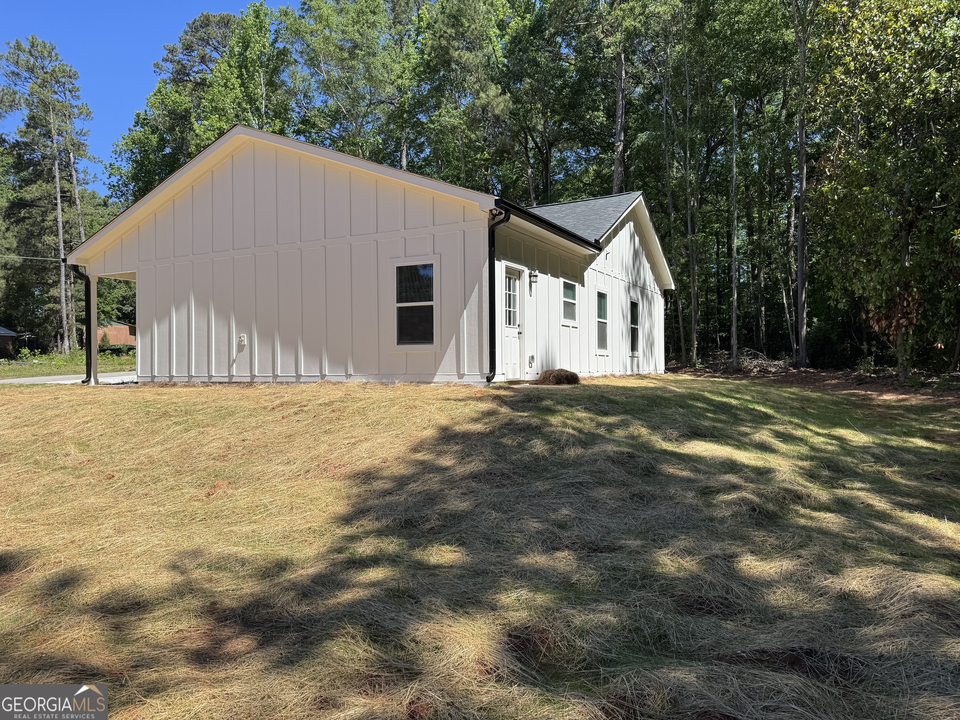 825 Mercer Drive Elberton, GA 30635 - Photo 18 of 22 a house with trees in the background