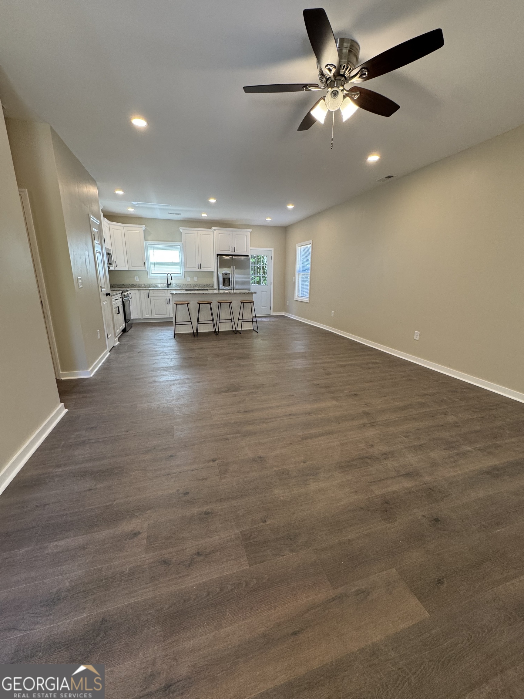 825 Mercer Drive Elberton, GA 30635 - Photo 3 of 22 a view of empty room with wooden floor