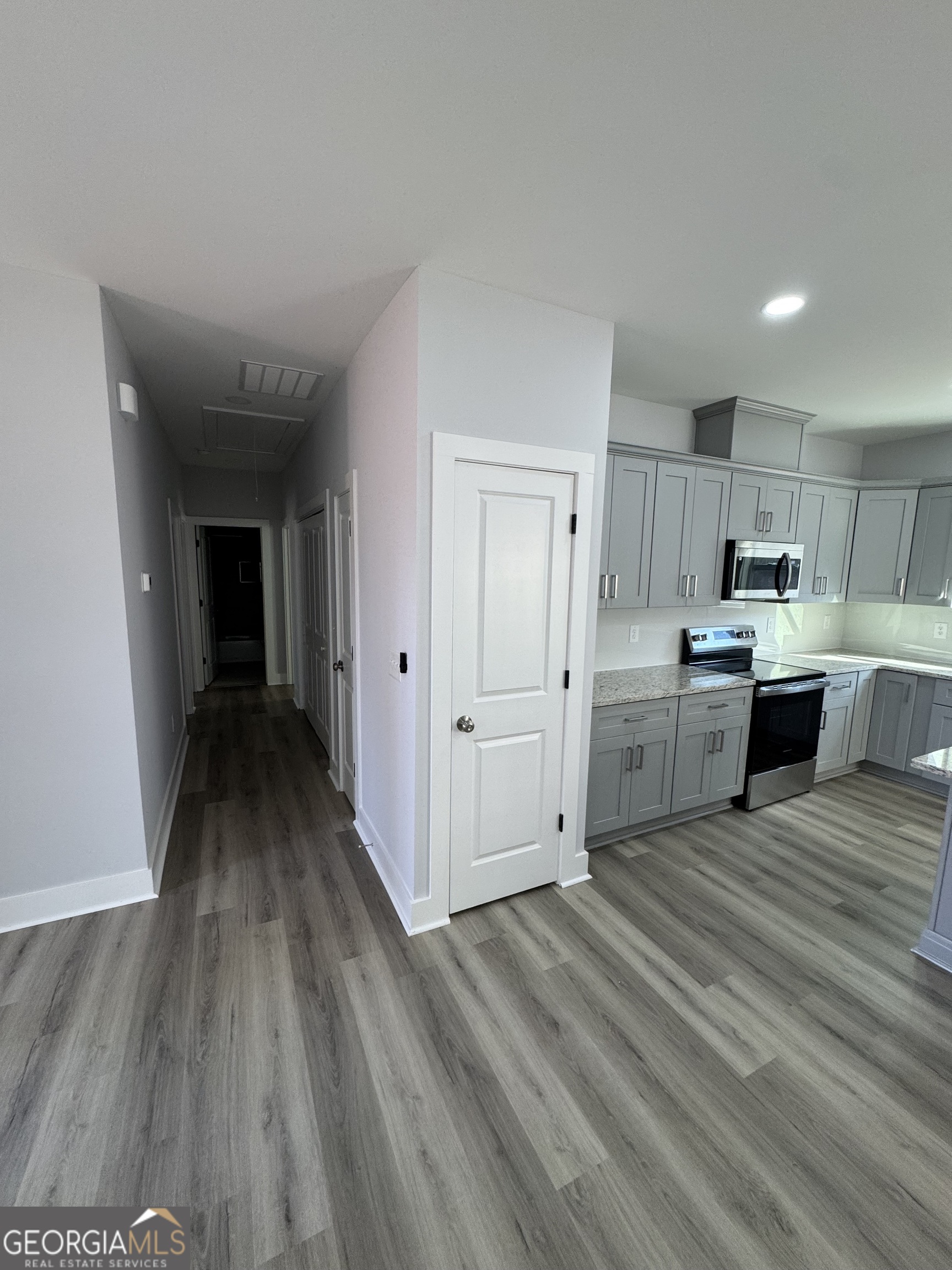 825 Mercer Drive Elberton, GA 30635 - Photo 7 of 16 a view of a kitchen with wooden floor