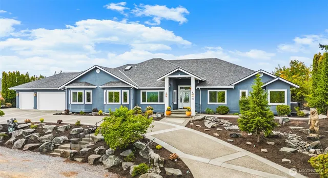 front view of a house with a patio