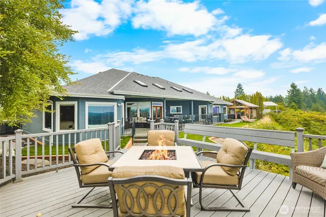a view of a house with a lounge chairs