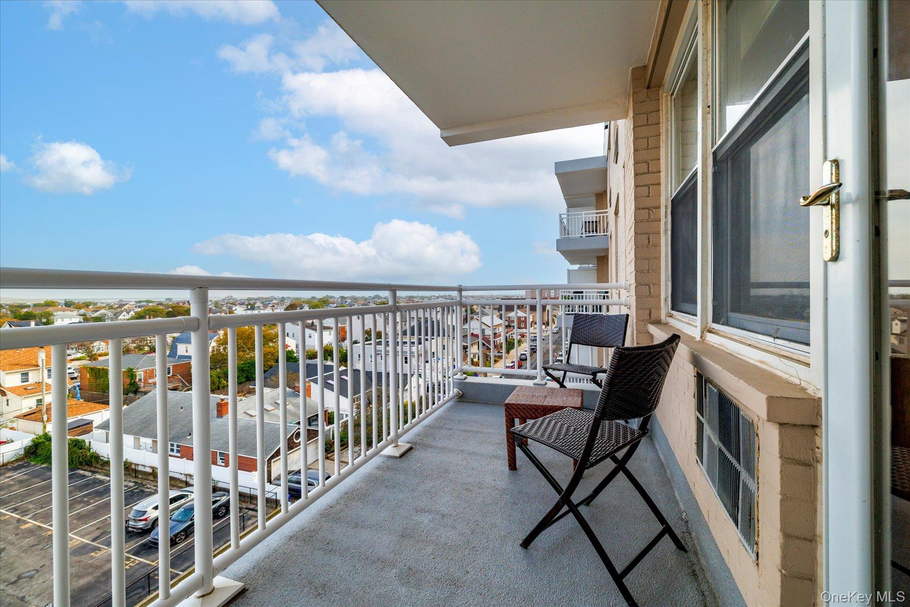 522 Shore Road, Unit 5P Long Beach, NY 11561 - Photo 11 of 28 a view of a balcony with furniture