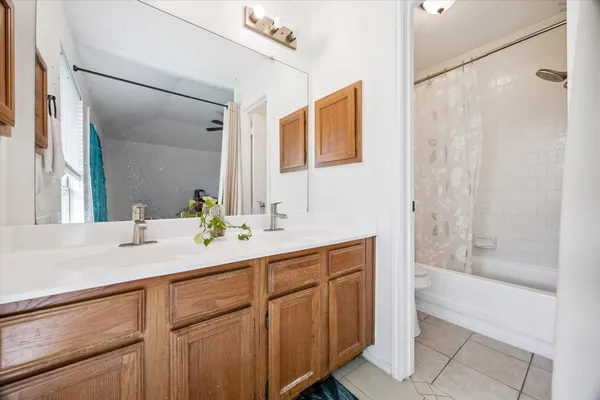 a bathroom with a sink and a bathtub